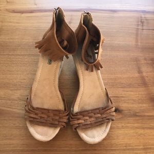 MinneTonka Fringe Leather Wedge Sandals